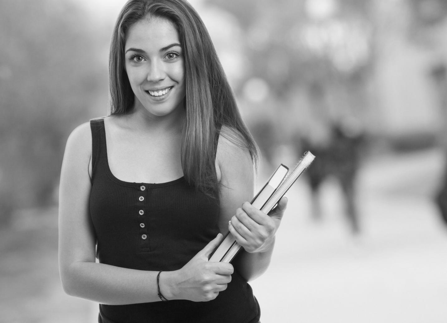 Students reviewing financial documents and budget planning materials